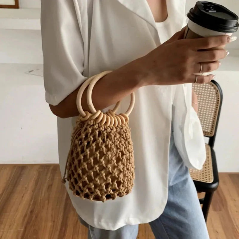 boho handbag with wooden handle and woven fabric design, multicolored