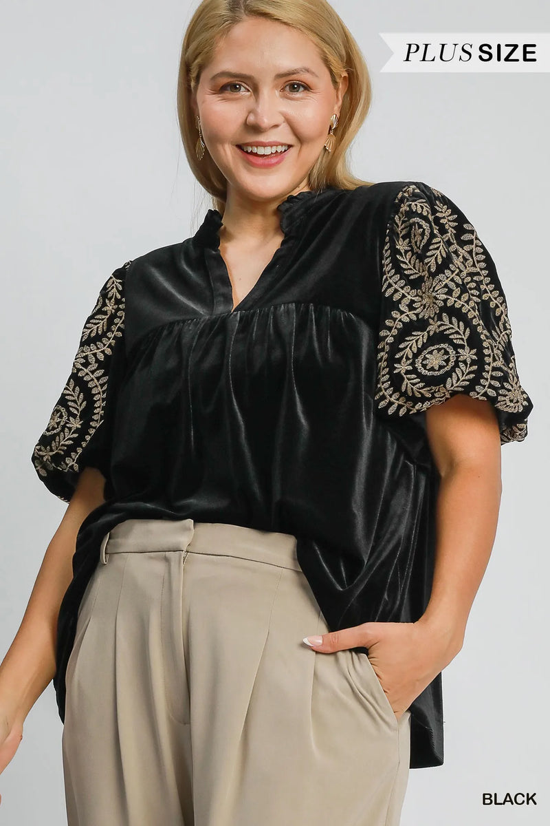 Woman wearing Velvet Embroidered Sleeve Blouse-This velvet embroidered sleeve blouse combines luxe velvet with embroidery for a sophisticated and stylish look. Perfect for adding a touch of glamour to your outfit.