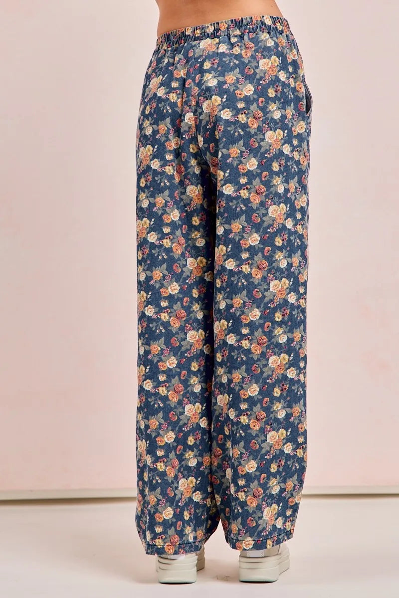 Shop Washed Floral Print Wide Leg Jeans-Boho meets vintage in these Floral Print Wide Leg Jeans featuring a high-waist, relaxed fit, soft floral denim with a touch of stretch. Style meets comfort.-Reef Love Boho-Chic Boutique
