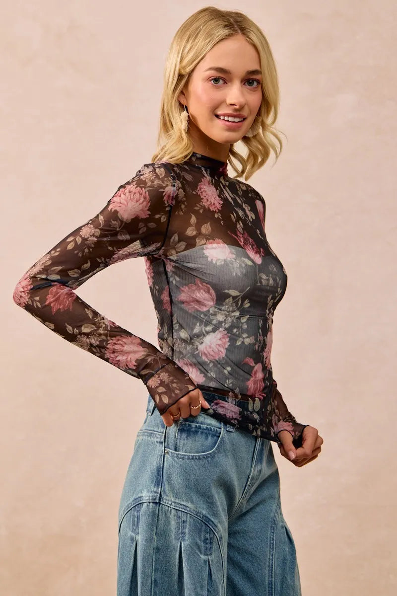 Shop Flower Printed Sheer Mesh Top with Thumb Opening-This stunning sheer mesh blouse features a romantic floral print in soft pink and coral tones against a dark base. Stretchy semi-transparent mesh fabric.-Reef Love Boho-Chic Boutique
