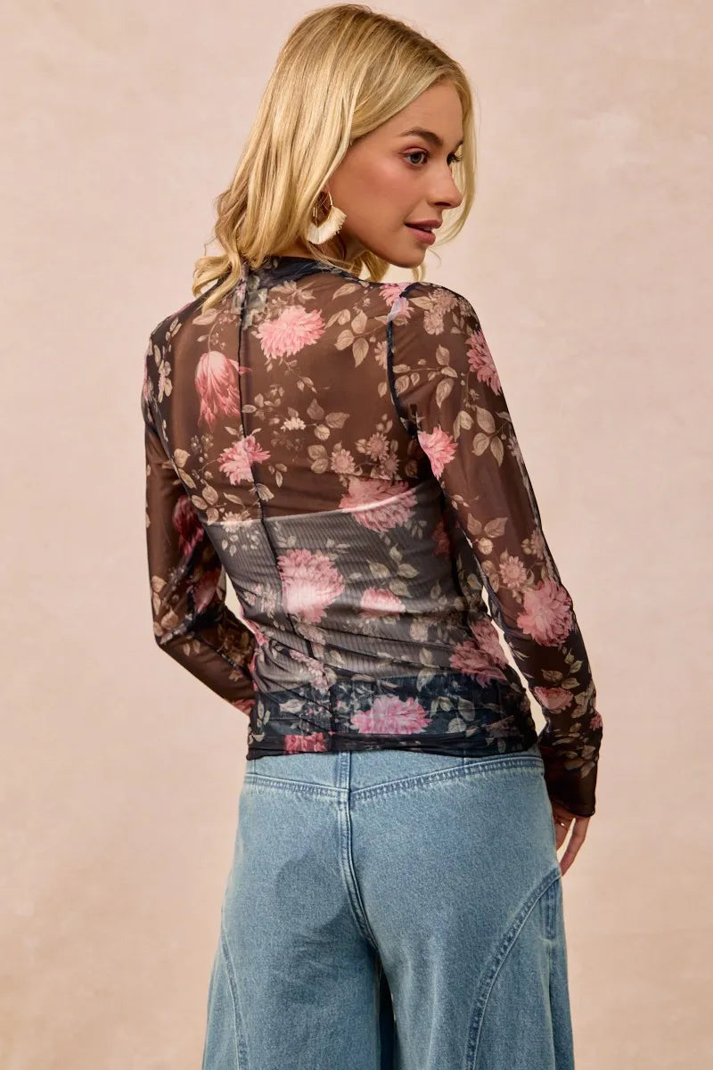 Shop Flower Printed Sheer Mesh Top with Thumb Opening-This stunning sheer mesh blouse features a romantic floral print in soft pink and coral tones against a dark base. Stretchy semi-transparent mesh fabric.-Reef Love Boho-Chic Boutique