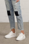 Shop Slouch Raw Hem Vintage Patched Cropped Jeans-Laid-back and vintage-inspired, the Slouch Raw Hem Patched Cropped Jeans feature patched knees, a raw hem, and mid-rise fit in 100% cotton light wash denim.-Reef Love Boho-Chic Boutique