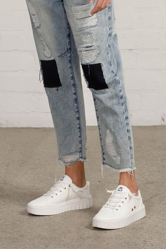 Shop Slouch Raw Hem Vintage Patched Cropped Jeans-Laid-back and vintage-inspired, the Slouch Raw Hem Patched Cropped Jeans feature patched knees, a raw hem, and mid-rise fit in 100% cotton light wash denim.-Reef Love Boho-Chic Boutique