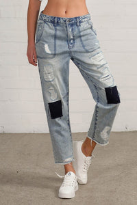 Shop Slouch Raw Hem Vintage Patched Cropped Jeans-Laid-back and vintage-inspired, the Slouch Raw Hem Patched Cropped Jeans feature patched knees, a raw hem, and mid-rise fit in 100% cotton light wash denim.-Reef Love Boho-Chic Boutique