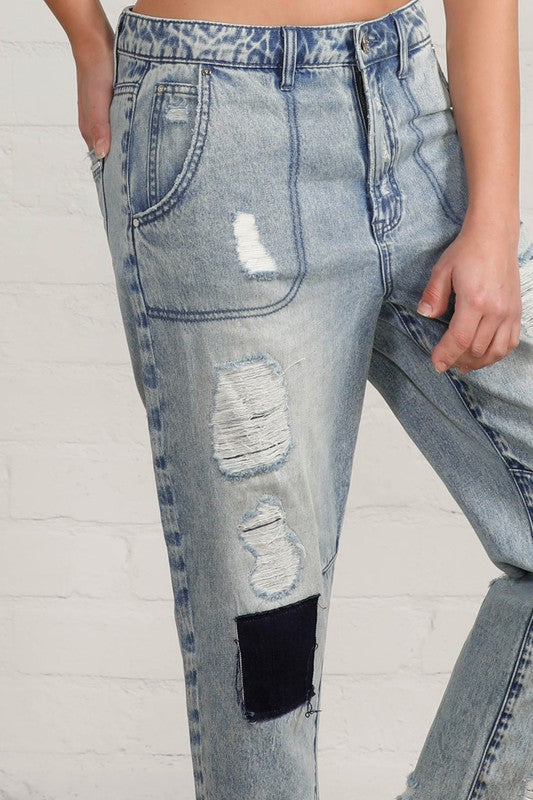 Shop Slouch Raw Hem Vintage Patched Cropped Jeans-Laid-back and vintage-inspired, the Slouch Raw Hem Patched Cropped Jeans feature patched knees, a raw hem, and mid-rise fit in 100% cotton light wash denim.-Reef Love Boho-Chic Boutique