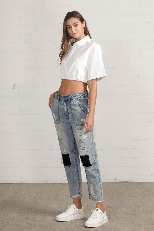 Shop Slouch Raw Hem Vintage Patched Cropped Jeans-Laid-back and vintage-inspired, the Slouch Raw Hem Patched Cropped Jeans feature patched knees, a raw hem, and mid-rise fit in 100% cotton light wash denim.-Reef Love Boho-Chic Boutique