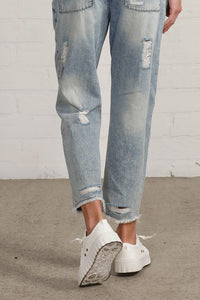 Shop Slouch Raw Hem Vintage Patched Cropped Jeans-Laid-back and vintage-inspired, the Slouch Raw Hem Patched Cropped Jeans feature patched knees, a raw hem, and mid-rise fit in 100% cotton light wash denim.-Reef Love Boho-Chic Boutique