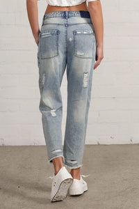Shop Slouch Raw Hem Vintage Patched Cropped Jeans-Laid-back and vintage-inspired, the Slouch Raw Hem Patched Cropped Jeans feature patched knees, a raw hem, and mid-rise fit in 100% cotton light wash denim.-Reef Love Boho-Chic Boutique
