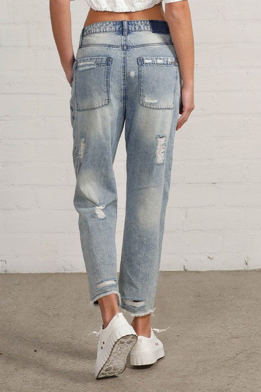 Shop Slouch Raw Hem Vintage Patched Cropped Jeans-Laid-back and vintage-inspired, the Slouch Raw Hem Patched Cropped Jeans feature patched knees, a raw hem, and mid-rise fit in 100% cotton light wash denim.-Reef Love Boho-Chic Boutique