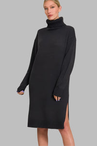 Woman wearing Turtle Neck Long Sleeve Midi Sweater Dress, Black-Turtle Neck Long Sleeve Midi Sweater Dress, a cozy and chic addition to your fall and winter wardrobe. This dress is perfect for casual and dressier occasions.