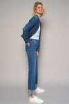 Woman wearing High Rise Cuff Cropped Bootcut Jeans-Flattering women's high-rise cuffed crop boot jeans in dark wash denim. Stretchy, cropped, and stylish—perfect for casual-chic looks.