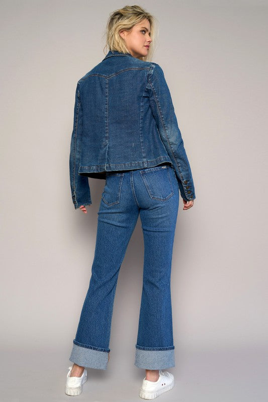 Woman wearing High Rise Cuff Cropped Bootcut Jeans-Flattering women's high-rise cuffed crop boot jeans in dark wash denim. Stretchy, cropped, and stylish—perfect for casual-chic looks.