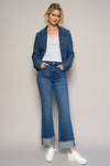 Woman wearing High Rise Cuff Cropped Bootcut Jeans-Flattering women's high-rise cuffed crop boot jeans in dark wash denim. Stretchy, cropped, and stylish—perfect for casual-chic looks.