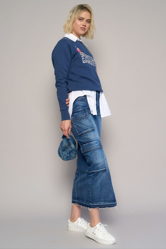 Shop Cargo Pocket Midi Denim Skirt-This Cargo Pocket Midi Denim Skirt features 8 functional pockets, a front slit, and a dark wash finish in 100% cotton denim. A must-have for everyday style.-Reef Love Boho-Chic Boutique
