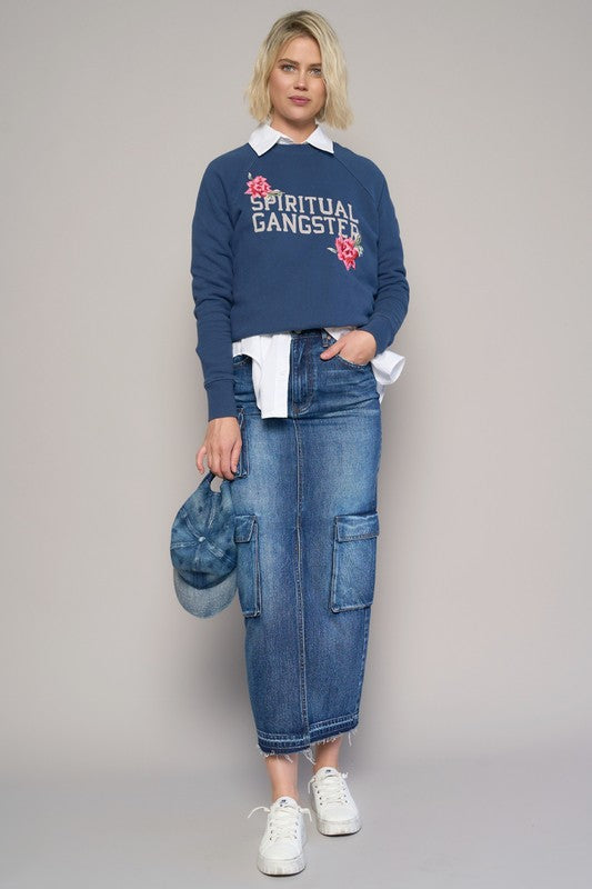 Shop Cargo Pocket Midi Denim Skirt-This Cargo Pocket Midi Denim Skirt features 8 functional pockets, a front slit, and a dark wash finish in 100% cotton denim. A must-have for everyday style.-Reef Love Boho-Chic Boutique