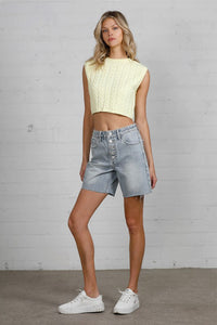Shop High Rise Mid-Length Bermuda Shorts-These High Rise Bermuda Shorts in medium wash denim feature a raw hem, flattering mid-thigh length, and 100% cotton construction—perfect for warm-weather style.-Reef Love Boho-Chic Boutique