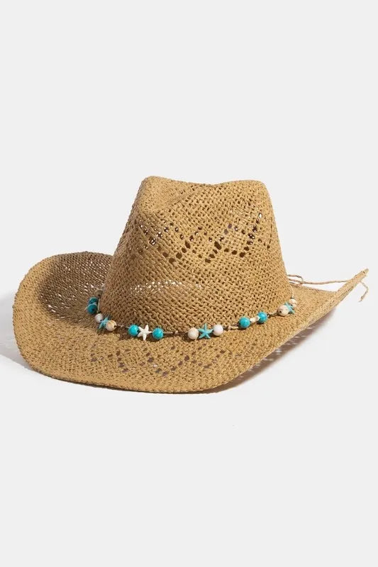 Woman wearing Turquoise & Shell Star Beads Strap Western Straw Hat-Western-style straw hat with turquoise and shell star beads. Lightweight, boho-chic, and perfect for festivals, beach days, or sunny adventures.