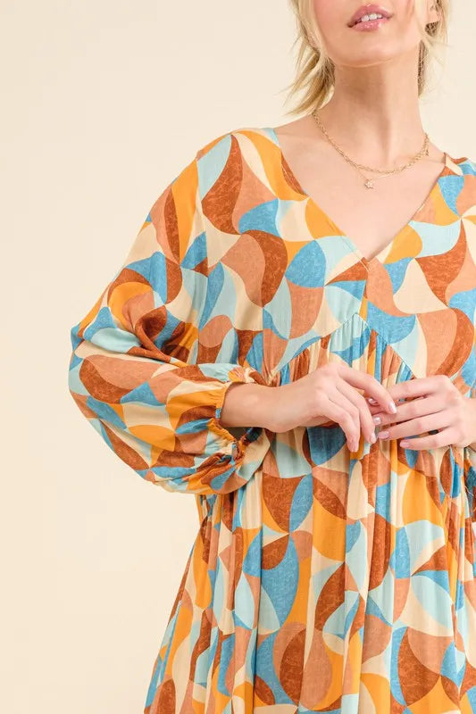Printed Open Back Puff Sleeve Casual Dress-The printed open back puff sleeve casual dress is a trendy and playful option for a fun and stylish look. The printed design adds a pop of color to the dress.-Reef Love Boho-Chic Boutique
