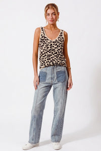 Chic leopard print knitted V-neck tank top, perfect for layering or warm weather.
