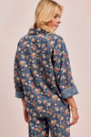 Shop Washed Floral Print Denim Shacket-This Washed Floral Print Denim Shacket features a relaxed oversized fit, button front, and vintage floral wash. Pair with wide leg jeans to complete the look.-Reef Love Boho-Chic Boutique