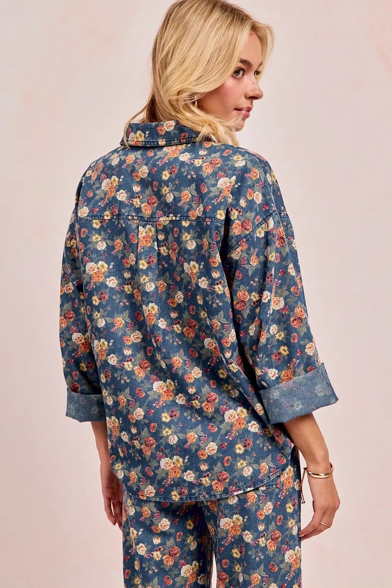 Shop Washed Floral Print Denim Shacket-This Washed Floral Print Denim Shacket features a relaxed oversized fit, button front, and vintage floral wash. Pair with wide leg jeans to complete the look.-Reef Love Boho-Chic Boutique