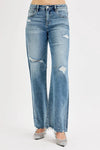 Woman wearing Relaxed Fit Wide Baggy Leg Washed Jeans-Mid-rise relaxed fit, wide baggy leg jeans feature a tie-washed design, slightly distressed for a cool and edgy aesthetic - for creating a casual trendy outfit.