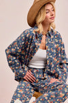 Shop Washed Floral Print Denim Shacket-This Washed Floral Print Denim Shacket features a relaxed oversized fit, button front, and vintage floral wash. Pair with wide leg jeans to complete the look.-Reef Love Boho-Chic Boutique