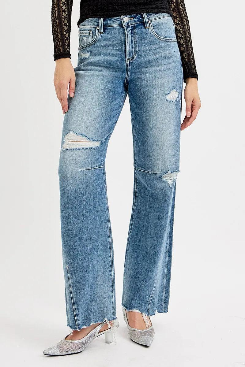 Woman wearing Relaxed Fit Wide Baggy Leg Washed Jeans-Mid-rise relaxed fit, wide baggy leg jeans feature a tie-washed design, slightly distressed for a cool and edgy aesthetic - for creating a casual trendy outfit.