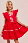 Gameday Ruffle Tier Mini Dress-Get gameday ready in this red tiered dress with contrast binding and ruffled details. A sporty-chic cotton favorite with playful details ready for football. -Reef Love Boutique