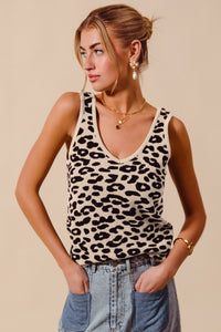 Chic leopard print knitted V-neck tank top, perfect for layering or warm weather.