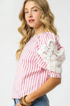 Shop Pink + White Striped Lace Puff Sleeve Blouse-Add a coastal twist to your wardrobe with this pink and white striped puff sleeve blouse. Features a cropped fit, oversized bow detail, breathable 100% cotton.-available at Reef Love online boho-chic boutique