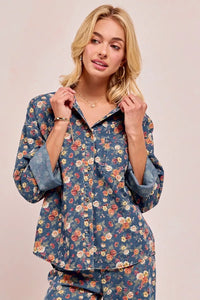 Shop Washed Floral Print Denim Shacket-This Washed Floral Print Denim Shacket features a relaxed oversized fit, button front, and vintage floral wash. Pair with wide leg jeans to complete the look.-Reef Love Boho-Chic Boutique