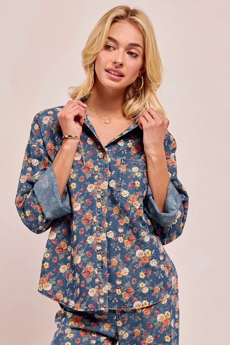 Shop Washed Floral Print Denim Shacket-This Washed Floral Print Denim Shacket features a relaxed oversized fit, button front, and vintage floral wash. Pair with wide leg jeans to complete the look.-Reef Love Boho-Chic Boutique