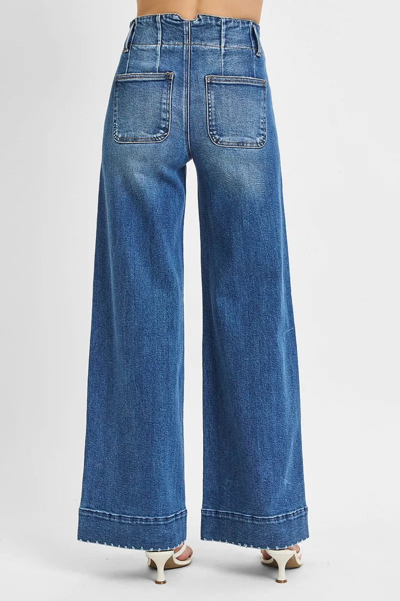 Woman wearing High Rise Wide Ankle Seam Detailed Jeans-Flattering high-rise ankle jeans with bold wide seams & raw hems. Available in standard & plus sizes. Slight stretch for comfort and everyday style.