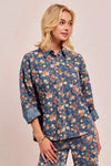 Shop Washed Floral Print Denim Shacket-This Washed Floral Print Denim Shacket features a relaxed oversized fit, button front, and vintage floral wash. Pair with wide leg jeans to complete the look.-Reef Love Boho-Chic Boutique