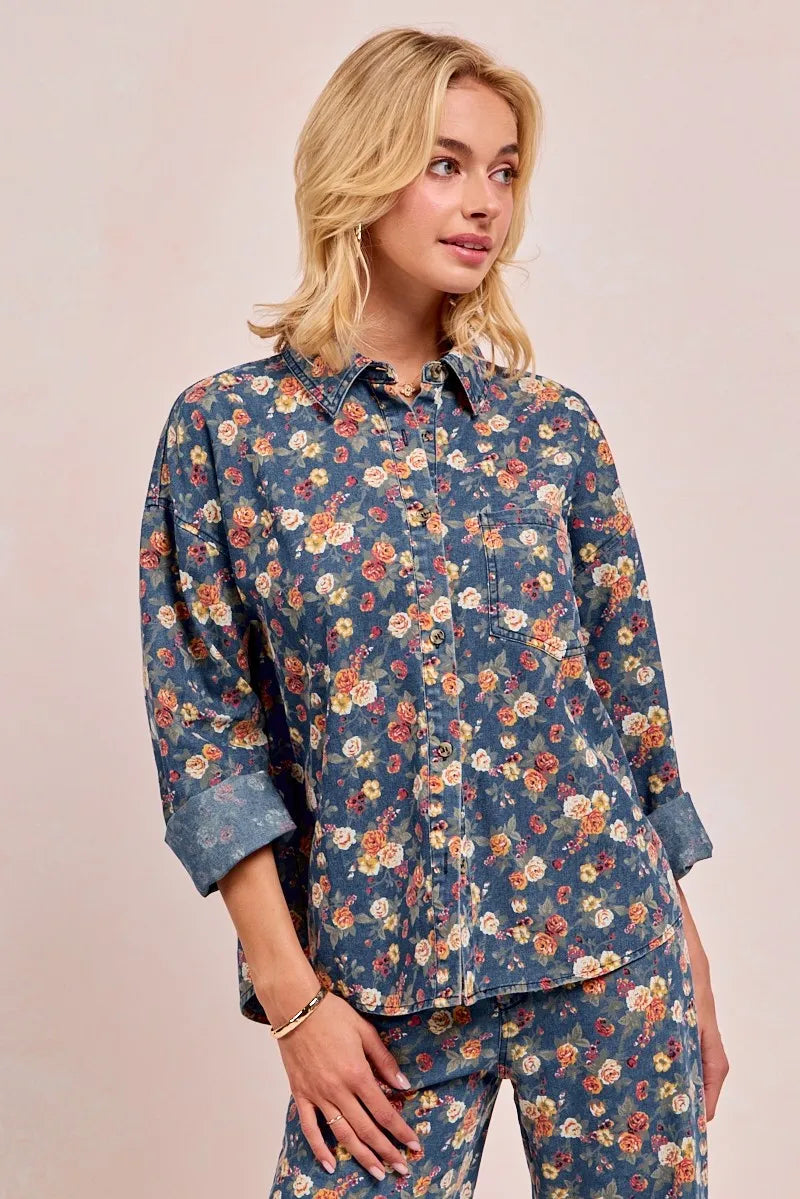 Shop Washed Floral Print Denim Shacket-This Washed Floral Print Denim Shacket features a relaxed oversized fit, button front, and vintage floral wash. Pair with wide leg jeans to complete the look.-Reef Love Boho-Chic Boutique