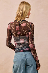Shop Flower Printed Sheer Mesh Top with Thumb Opening-This stunning sheer mesh blouse features a romantic floral print in soft pink and coral tones against a dark base. Stretchy semi-transparent mesh fabric.-Reef Love Boho-Chic Boutique