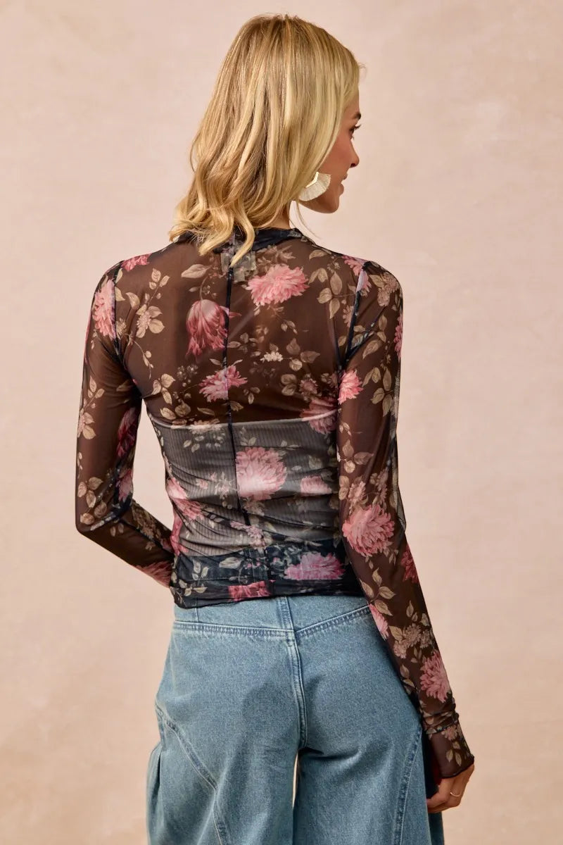 Shop Flower Printed Sheer Mesh Top with Thumb Opening-This stunning sheer mesh blouse features a romantic floral print in soft pink and coral tones against a dark base. Stretchy semi-transparent mesh fabric.-Reef Love Boho-Chic Boutique