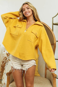 Woman wearing Honey Mustard Fleece Collared Sweatshirt-Fleece collared sweatshirt with flap pockets and button details. Cozy, stylish, and perfect for layering all season long, your new cozy fall favorite.