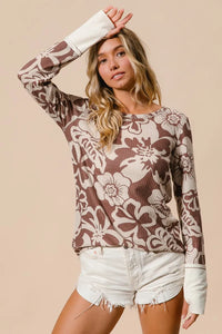 Shop Flower Printed Waffle Thumb Opening Top-Cozy and casual, flower printed waffle knit top features thumb openings, a classic crew neck, and a relaxed fit. Ideal for layering during transitional seasons.-Reef Love Boho-Chic Boutique