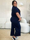 Textured, stretchy, and comfy. This two piece cropped pant with short sleeve top is a great travel set to stay comfortable in the car or plane. Available in a variety of colors and extended sizes.