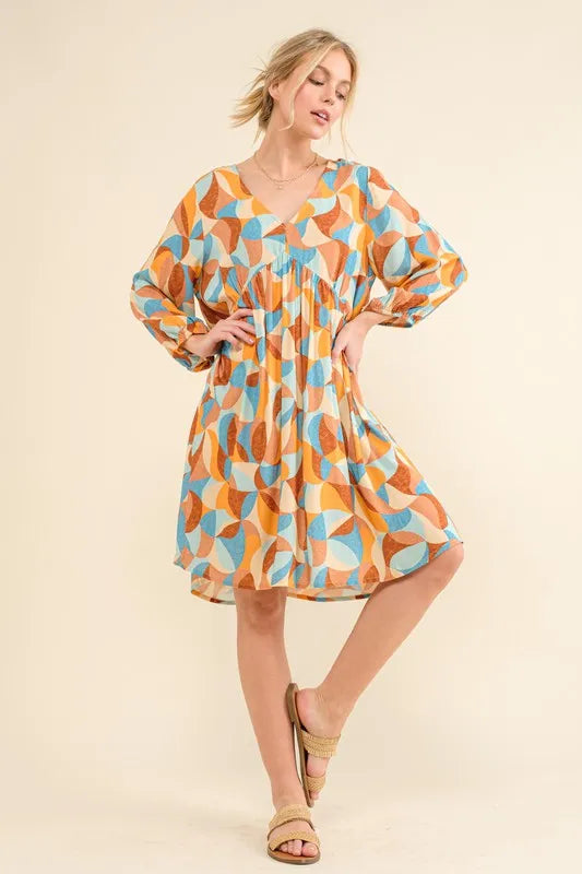 Printed Open Back Puff Sleeve Casual Dress-The printed open back puff sleeve casual dress is a trendy and playful option for a fun and stylish look. The printed design adds a pop of color to the dress.-Reef Love Boho-Chic Boutique