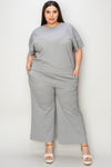 Textured, stretchy, and comfy. This two piece cropped pant with short sleeve top is a great travel set to stay comfortable in the car or plane. Available in a variety of colors and extended sizes.