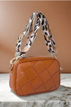 Woven light brown faux leather crossbody women’s bag with removable fabric strap with animal print