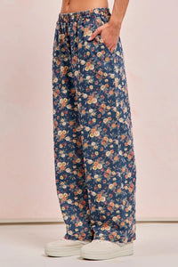 Shop Washed Floral Print Wide Leg Jeans-Boho meets vintage in these Floral Print Wide Leg Jeans featuring a high-waist, relaxed fit, soft floral denim with a touch of stretch. Style meets comfort.-Reef Love Boho-Chic Boutique