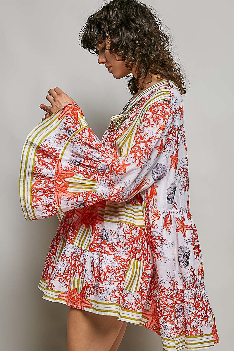 POL Striped Floral Long Sleeve Mini Dress with coral, starfish, and seashell print, V-neck, and tiered silhouette.