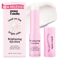 Woman wearing Grace & Stella Caffeine Under Eye Brightener Balm Stick-De-puff + brighten tired eyes with this caffeine-infused under eye balm stick. Hydrating, vegan, compact—your skincare essential on the go.