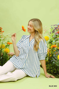 Chic striped puff sleeve blouse with V-neck, wide collar, and delicate piping, perfect for effortless everyday style.