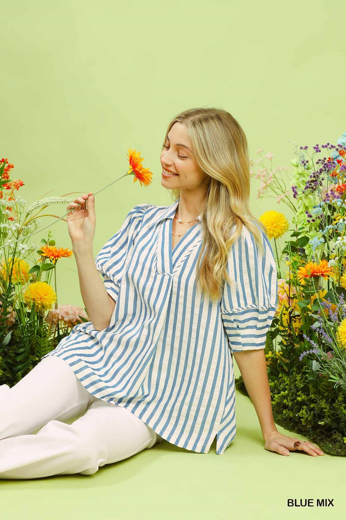 Chic striped puff sleeve blouse with V-neck, wide collar, and delicate piping, perfect for effortless everyday style.