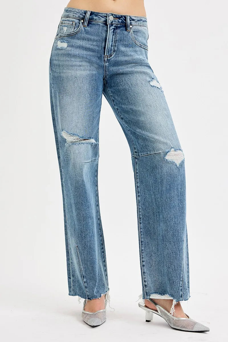 Woman wearing Relaxed Fit Wide Baggy Leg Washed Jeans-Mid-rise relaxed fit, wide baggy leg jeans feature a tie-washed design, slightly distressed for a cool and edgy aesthetic - for creating a casual trendy outfit.